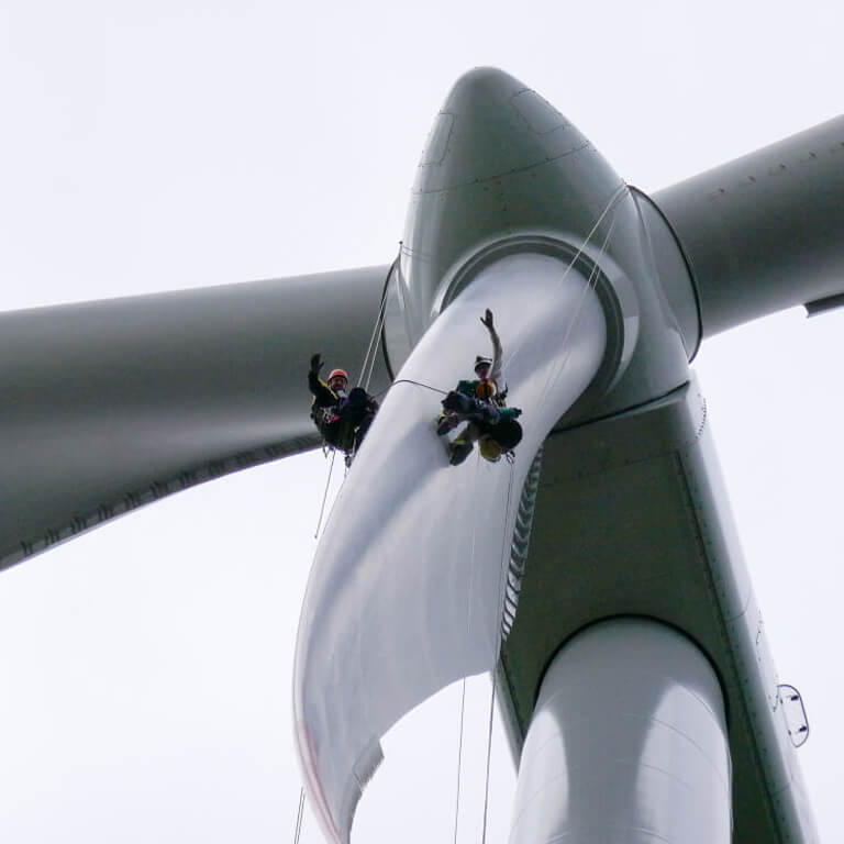 energy workers waving