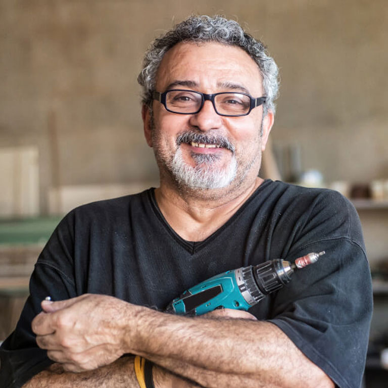 Tradesman holding drill