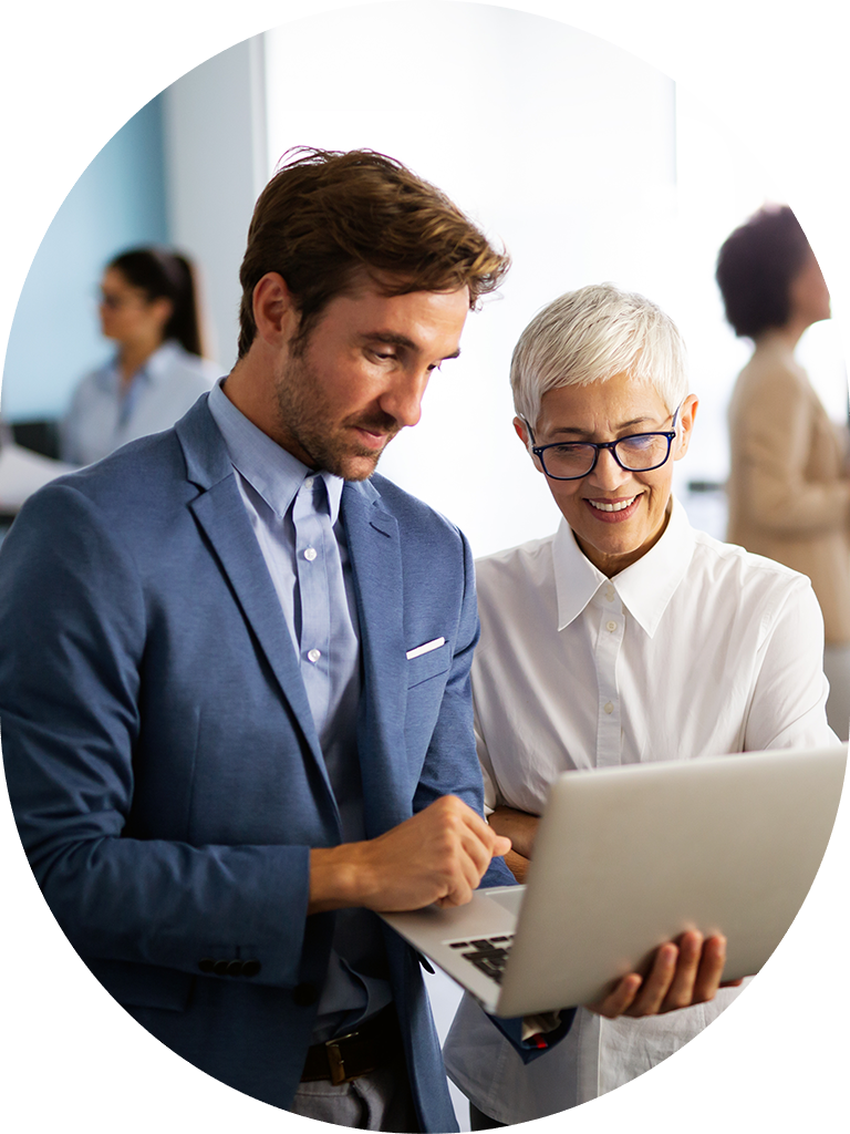 man showing lady laptop 