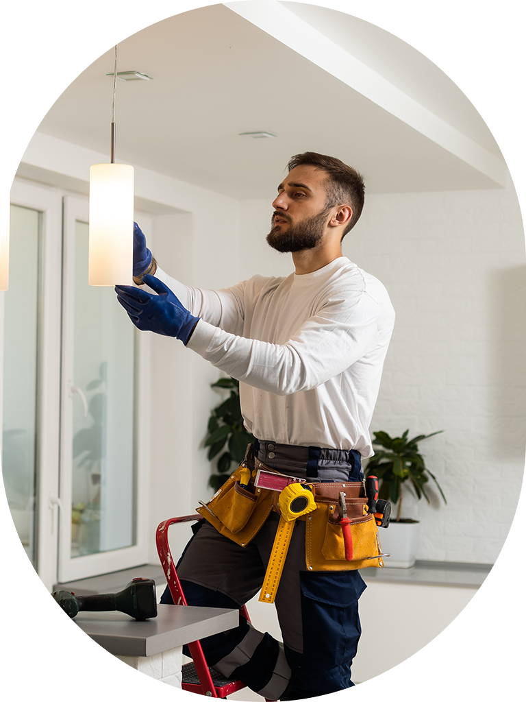 electrician installing light