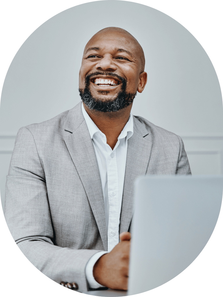 Contractor smiling with laptop